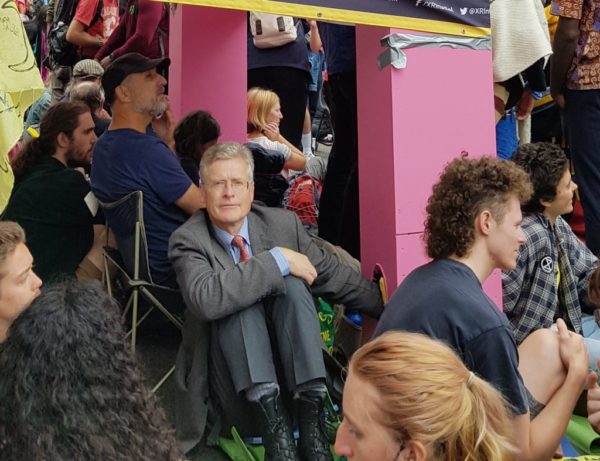 Nigel-Harvey-locked-onto-big-pink-table