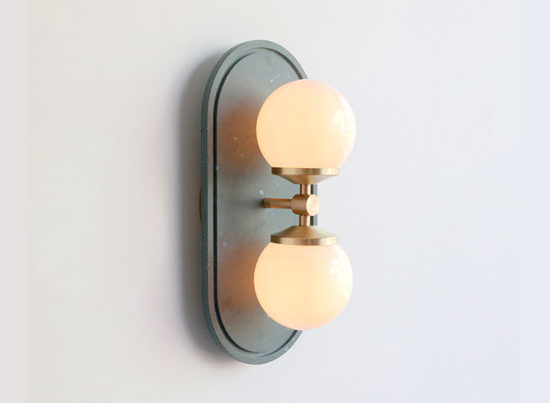 a bathroom light with two light bulbs