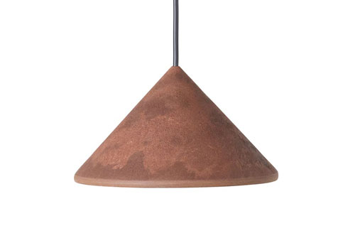 Danish design brand Mater has introduced the Terra lighting collection, a series of pendants and companion fixtures designed by Copenhagen studio OEO Studio that uses a circular bio-composite material incorporating coffee waste and other post-consumer residues.