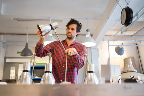 A Skinflint employee with some reclaimed luminaires